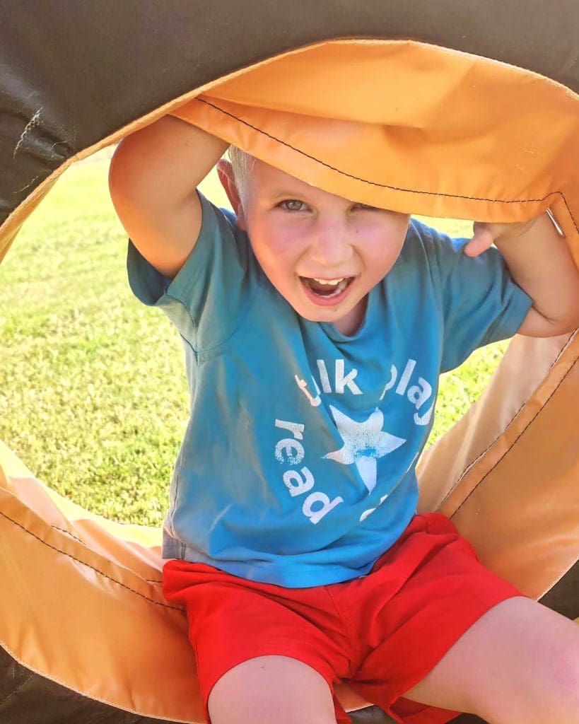 Happy child playing outdoors