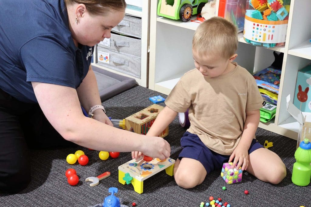 Child with occupational therapist